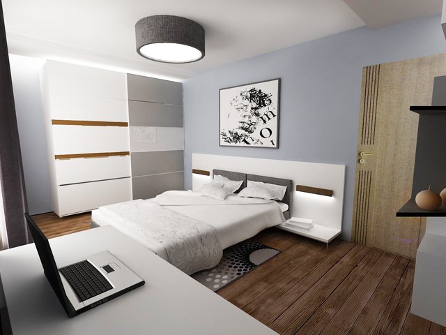 Спалнята е решена в бяло, сиво и светло синьо